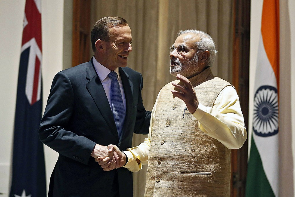 Tony Abbott, the Australian prime minister, with his Indian counterpart Narendra Modi. The two leaders were expected to sign a landmark agreement for Canberra to supply uranium to New Delhi. Photo: Reuters