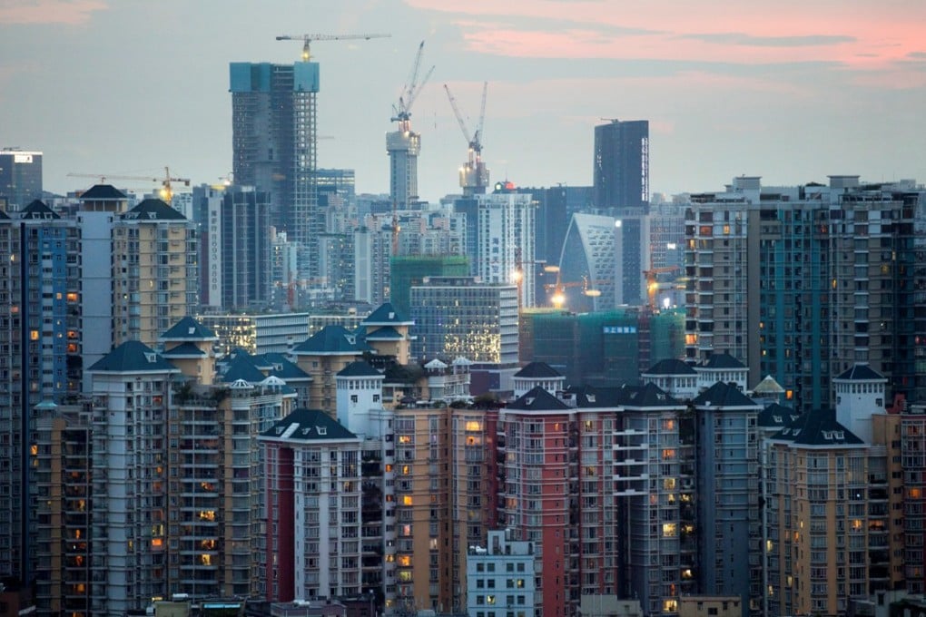 Commercial and residential buildings stand in the Nanshan district of Shenzhen. Although Guandong is one of China's most successful provinces, much of its prosperity remains centred around the Pearl River Delta. Photo: Bloomberg