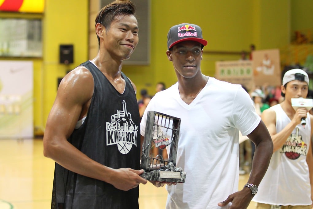 Fong Shing-yee (left) with Celtics star Rajon Rondo, doesn't think the local league is going anywhere. Photo: K. Y. Cheng