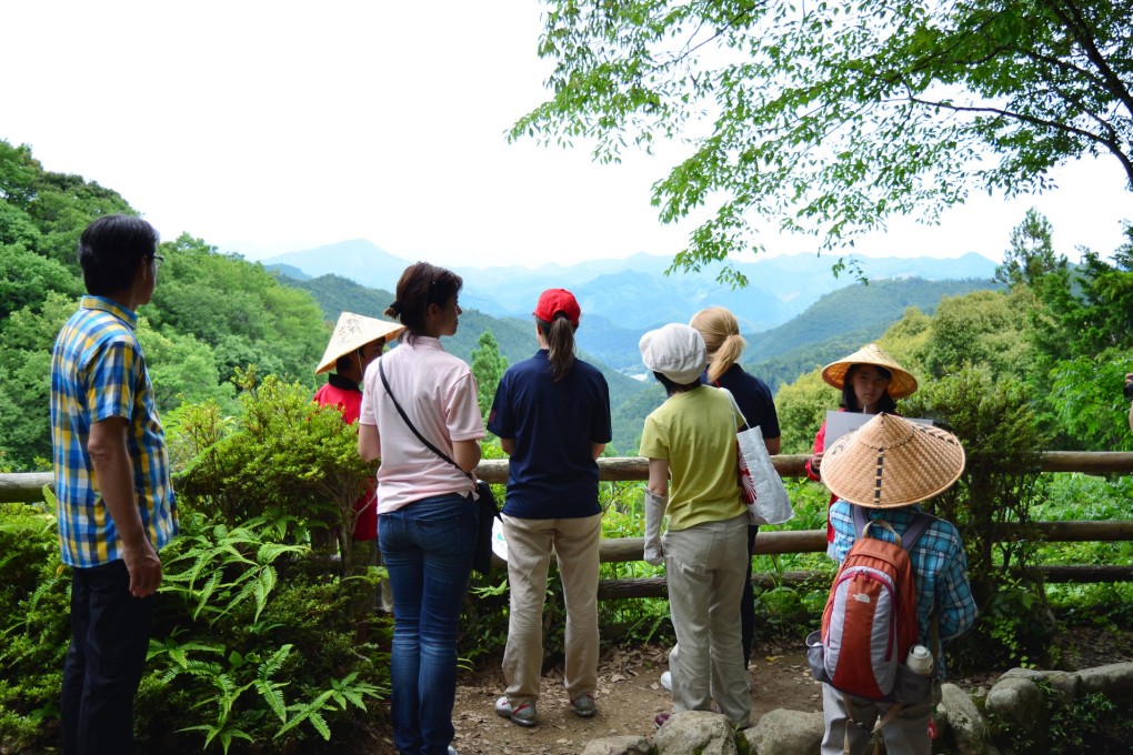 Visitors admire the view at Kumano Kodo, a pilgrimage trail and a Unesco world heritage site, in Tanabe, Japan. Photo: SCMP