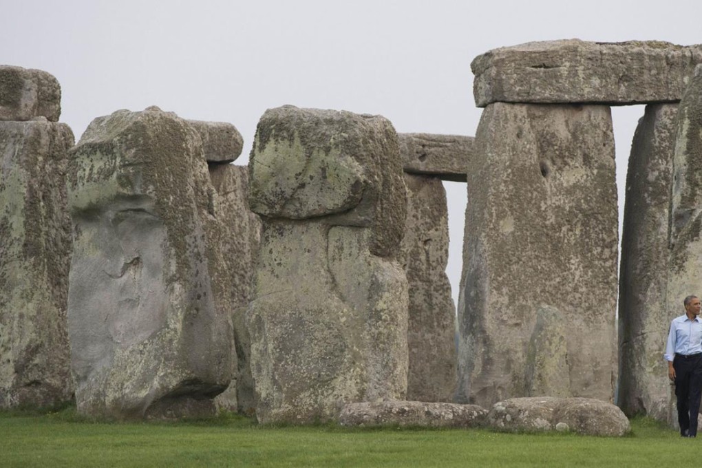 US President Barack Obama tours the prehistoric English monument of Stonehenge, relaxing after stressful days at a Nato summit. Photo: AFP