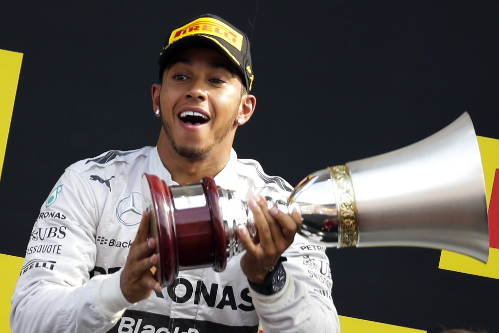 Britain's Lewis Hamilton celebrates his victory at Monza after winning the Italian Grand Prix. Photo: Reuters