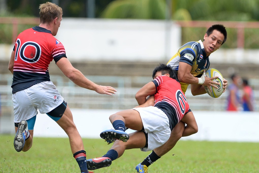 Hong Kong beat Thailand 45-0 in their opening pool game at the 2014 Malaysia Sevens in Kuala Lumpur. Photo: ARFU