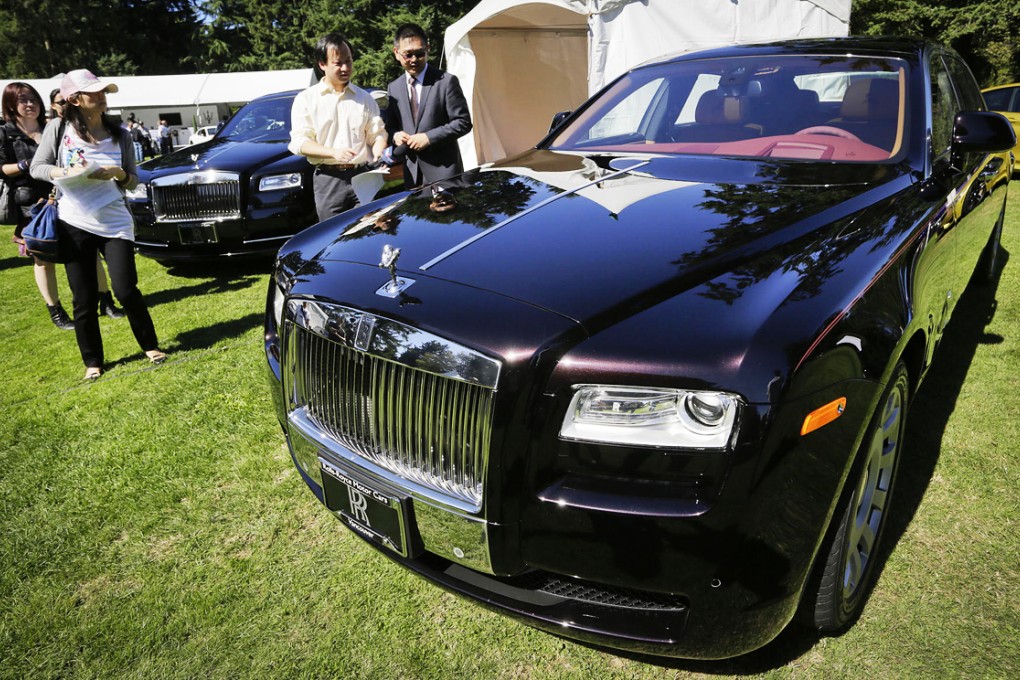 A "Year of the horse" special edition Rolls-Royce is displayed at the Vancouver car show at the Botanical Garden in Vancouver. Photo: Xinhua