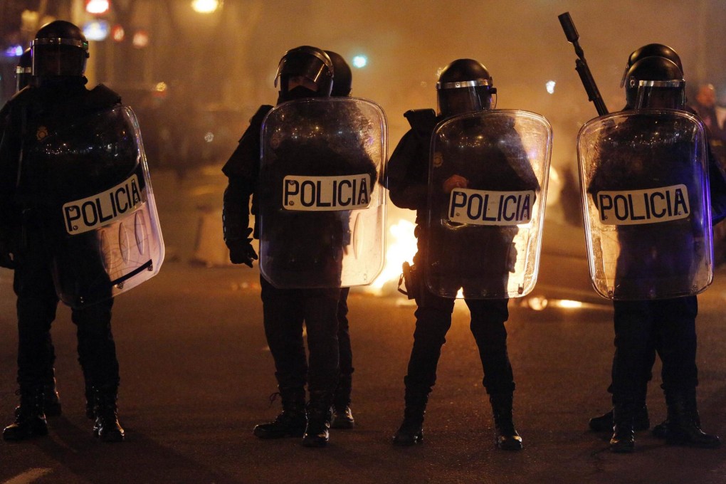 Riot police maintain that their equipment is outdated. Photo: AFP
