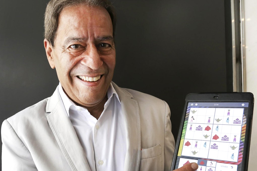 Jeevan Hingorani shows off the Sudoku Junior app. Photo: Jonathan Wong