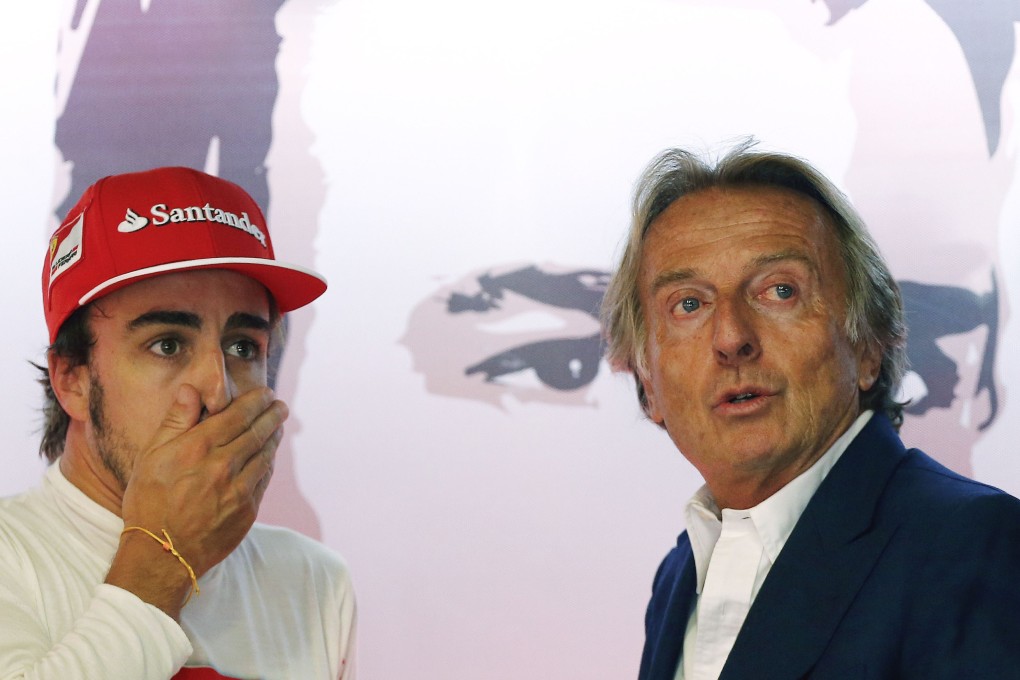 Ferrari Formula One driver Fernando Alonso with outgoing Ferrari president Luca di Montezemolo at last weekend's Italian Grand Prix in Monza. Ferrari have not won a constructors title since 2008 and this season have gone from bad to worse. Photo: Reuters