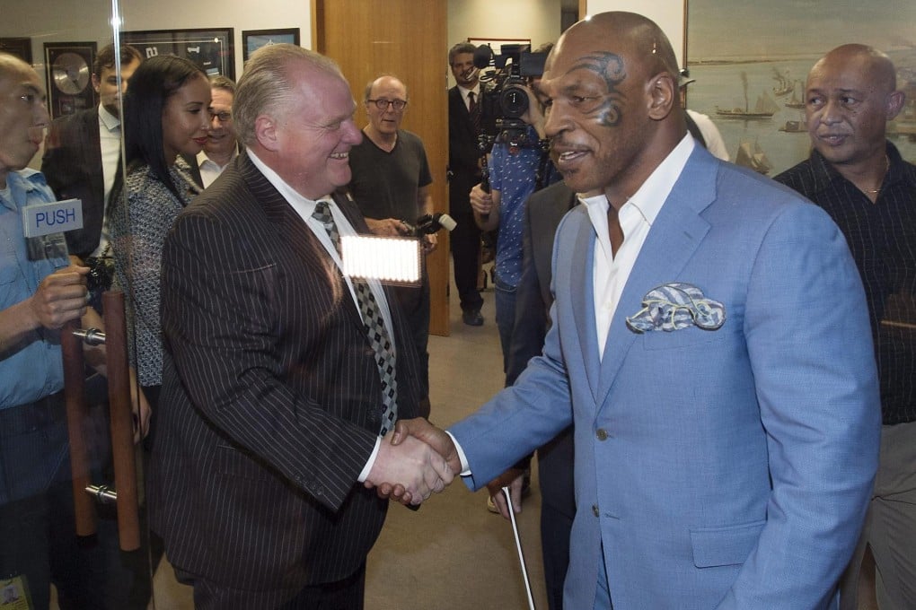 Toronto Mayor Rob Ford with Mike Tyson in the city. Photo: AP