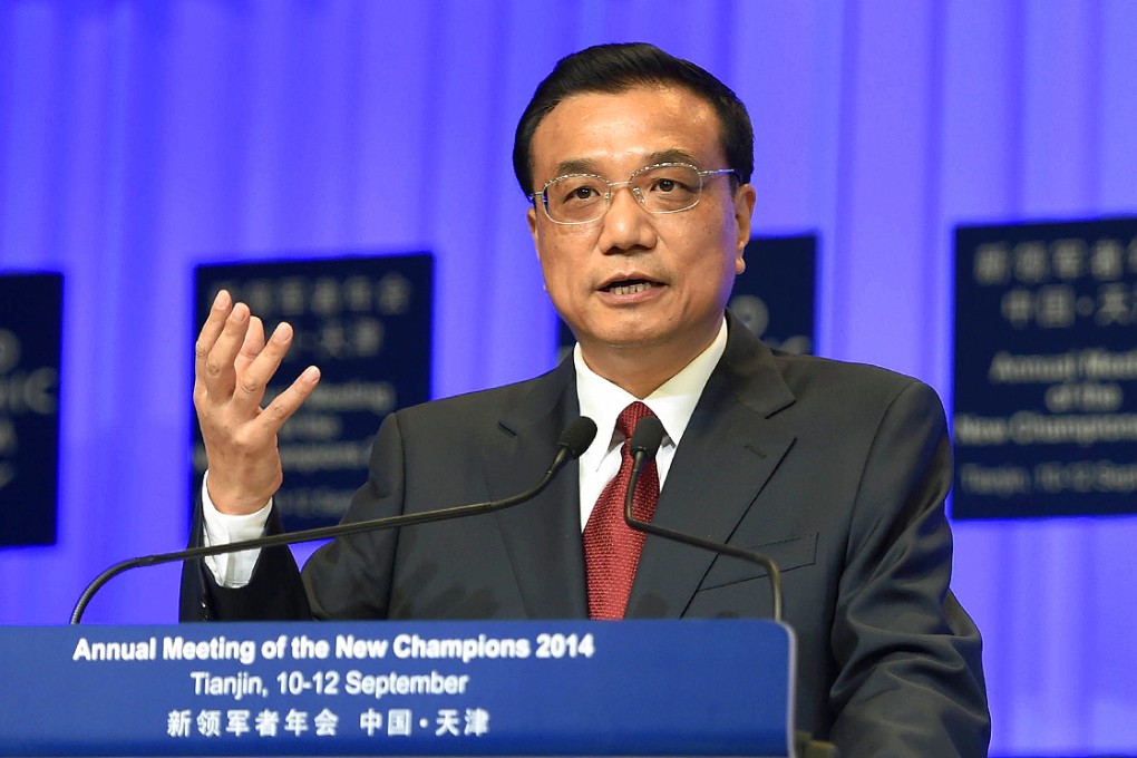 Li Keqiang addresses the World Economic Forum in Tianjin. He failed to offer any new initiatives on the economy, leaving many participants disappointed. Photo: Xinhua