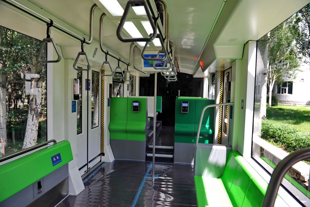 China CNR has entered into 12 contracts for train carriages such as passenger coaches, ore-transporting wagons, multiple units, metro cars and wind turbines. Photo: Xinhua