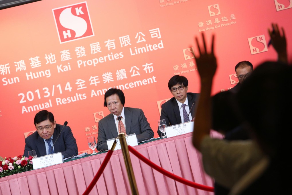 SHKP’s co-chairmen Raymond Kwok (left) and Thomas Kwok, and director Thomas Chan at the results briefing yesterday. Photo: Felix Wong