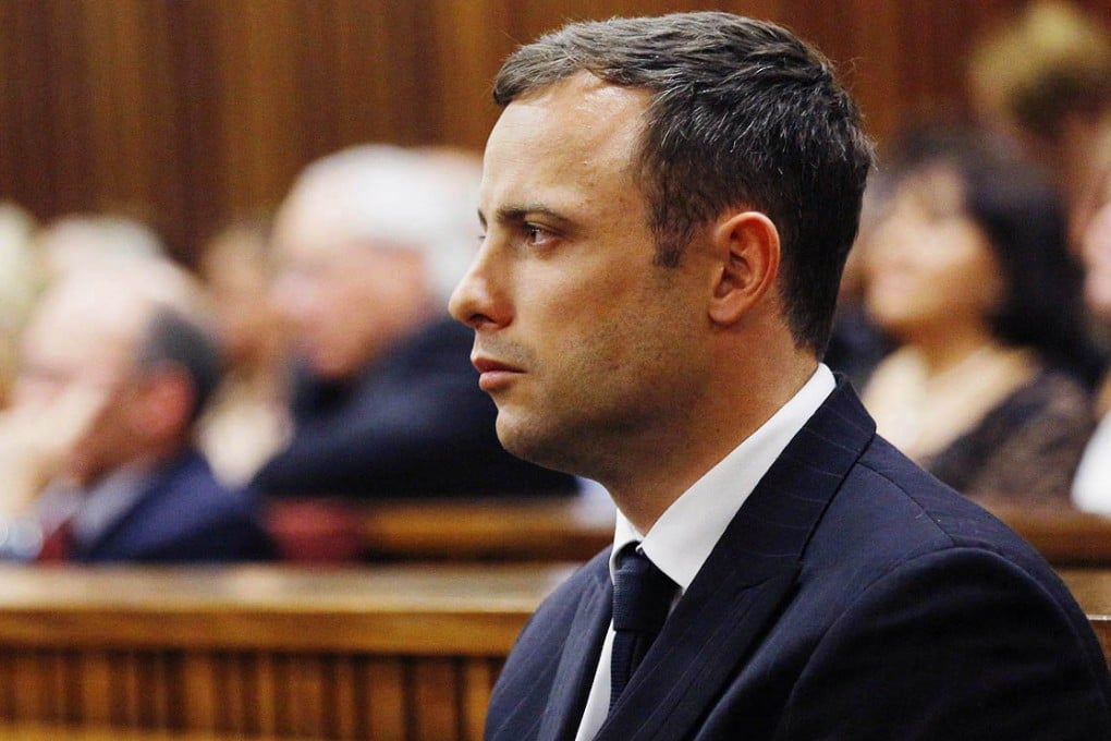 Oscar Pistorius stands in the dock in Pretoria's High Court. Photo: EPA