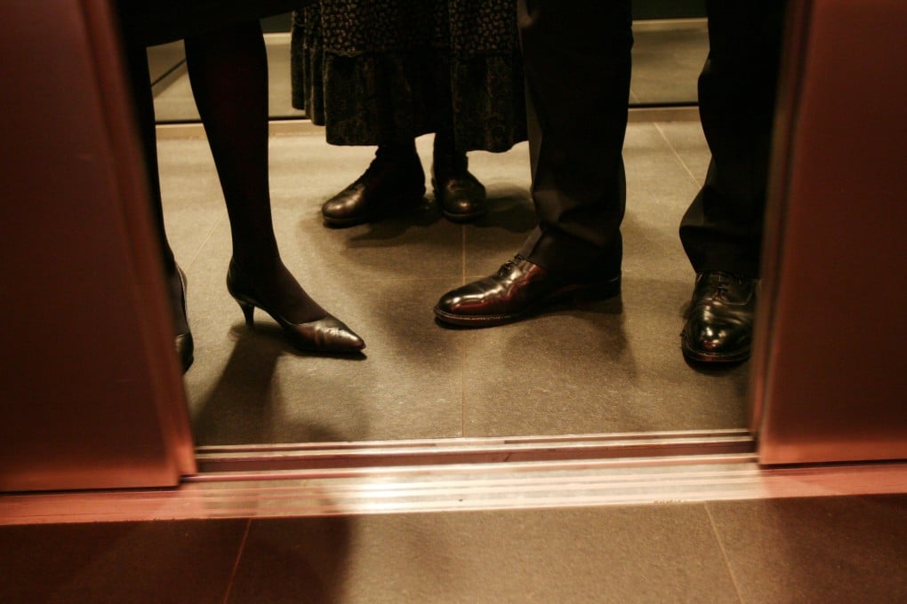 People step into a lift in this file photo. Johnny Kong Lin-fat was diagnosed with an adjustment disorder after a lift malfunctioned in Chang Pao Ching Building. Photo: Bloomberg
