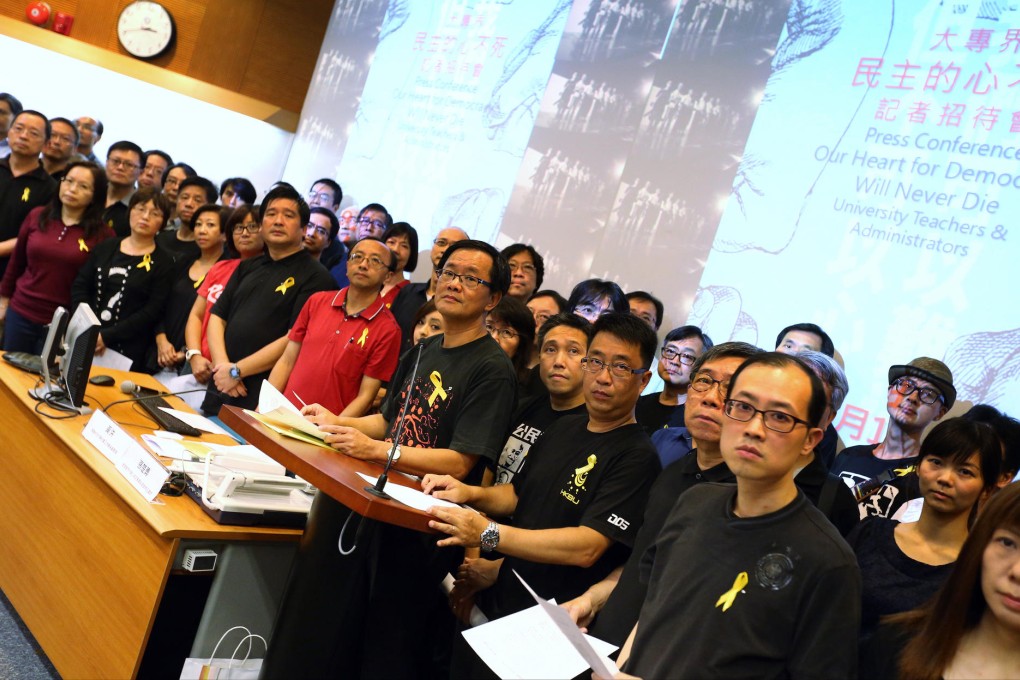 Some of the 520 academics who issued a statement criticising the "undemocratic" framework for the 2017 elections. Photo: K. Y. Cheng