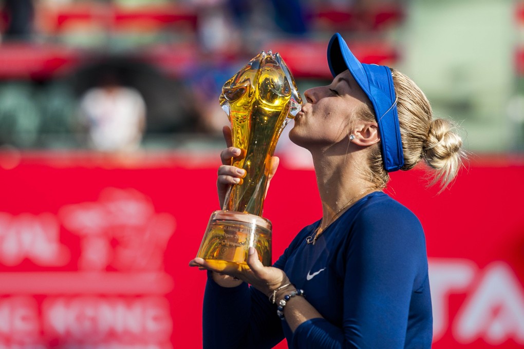 Sabine Lisicki of Germany kisses the trophy after beating the Czech Republic's Karolina Pliskova in the final of the Hong Kong Open. Photo: AFP