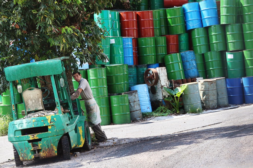 Oil drums is seen in Po Yuen Lard Company, the supplier of 'gutter oil' to Taiwan's Chang Guann, in Yuen Long. Photo: David Wong