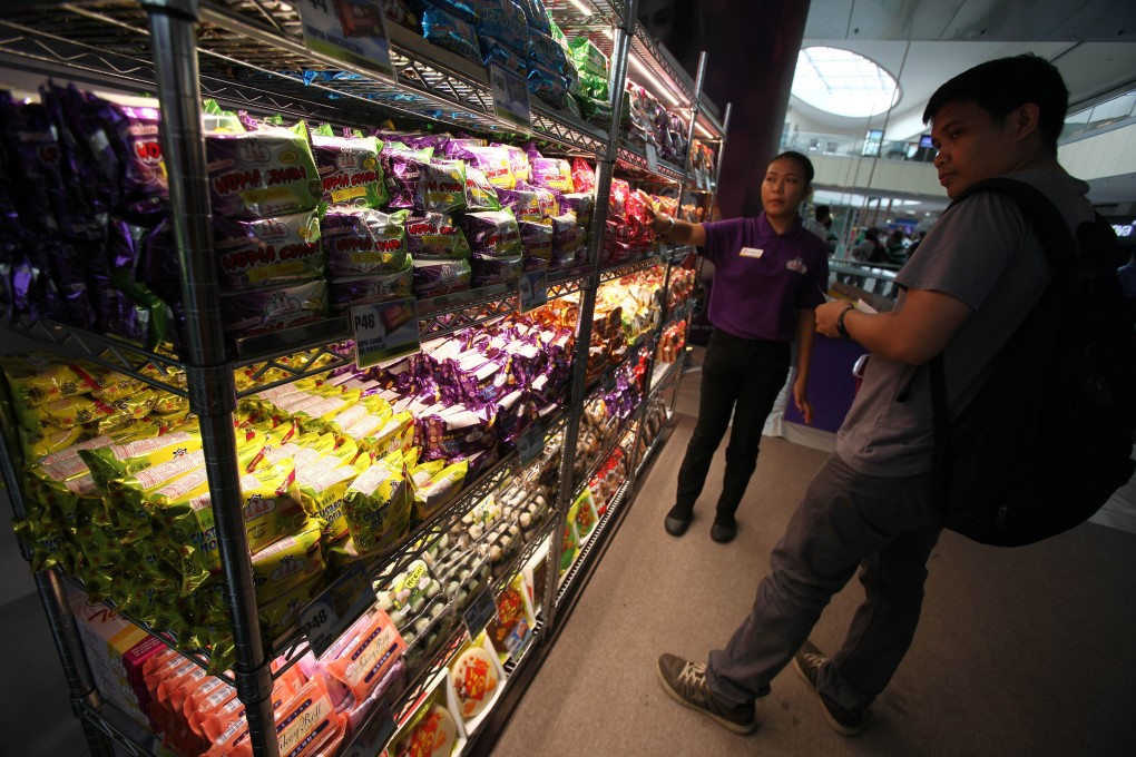 Jiashili will no doubt seek to counter any concerns by highlighting its product range, which includes mooncakes and shallot-flavoured biscuits, and that it mainly serves the mass market. Photo: Xinhua