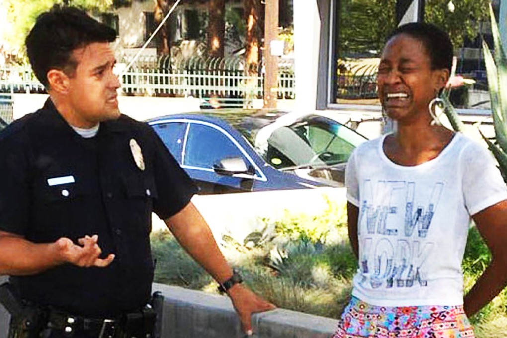 A handcuffed Daniele Watts in a picture she posted on her Facebook page.