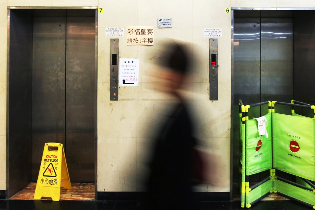 Senior mechanical inspector Ng Wai-leung told Eastern Court he found thick layers of dust around the safety gear at the bottom of the shaft, about a month after lift No 5 at King's Tower on King's Road plunged from the first to the ground floor in March last year. Photo: David Wong