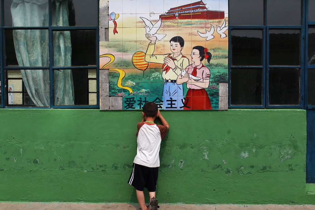 China's hukou system means many migrants still cannot enjoy full benefits and services such as social security, medical insurance and school places. Photo: EPA