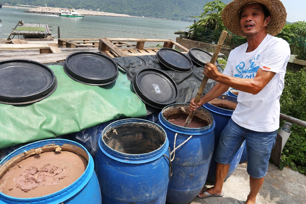 Cheng Kai-keung, 59, the owner of Cheng Cheung Hing Shrimp Paste Factory, says the traditional mixing and moulding process is dying. Photo: Nora Tam