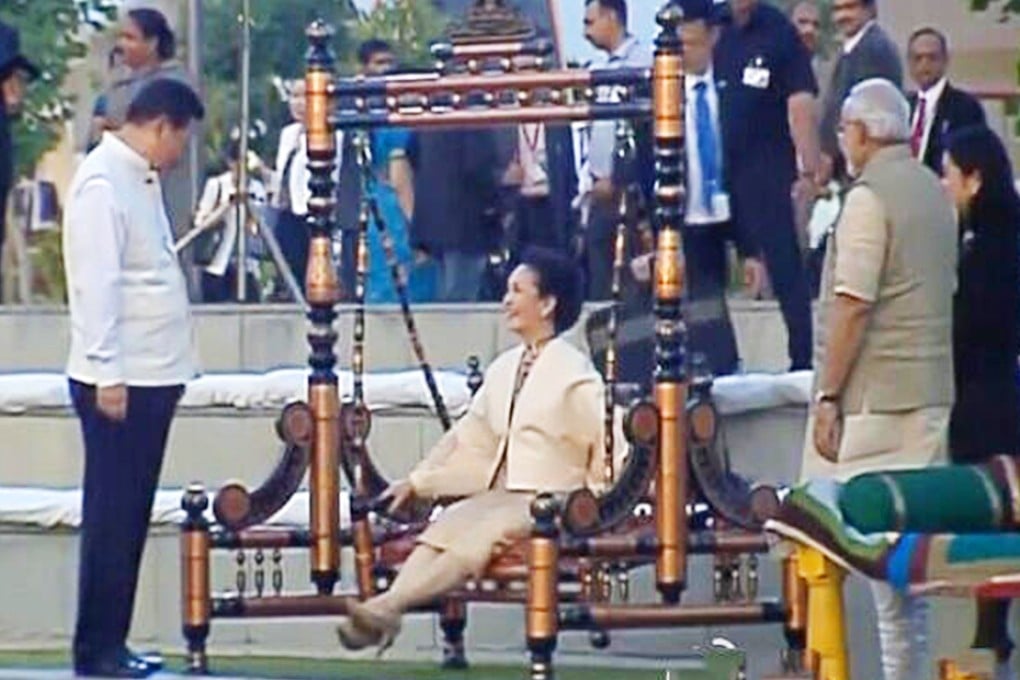 First lady Peng Liyuan on a traditional swing seat in Ahmedabad, where she and her husband, President Xi Jinping, were greeted by India's Narendra Modi. Photo: SCMP