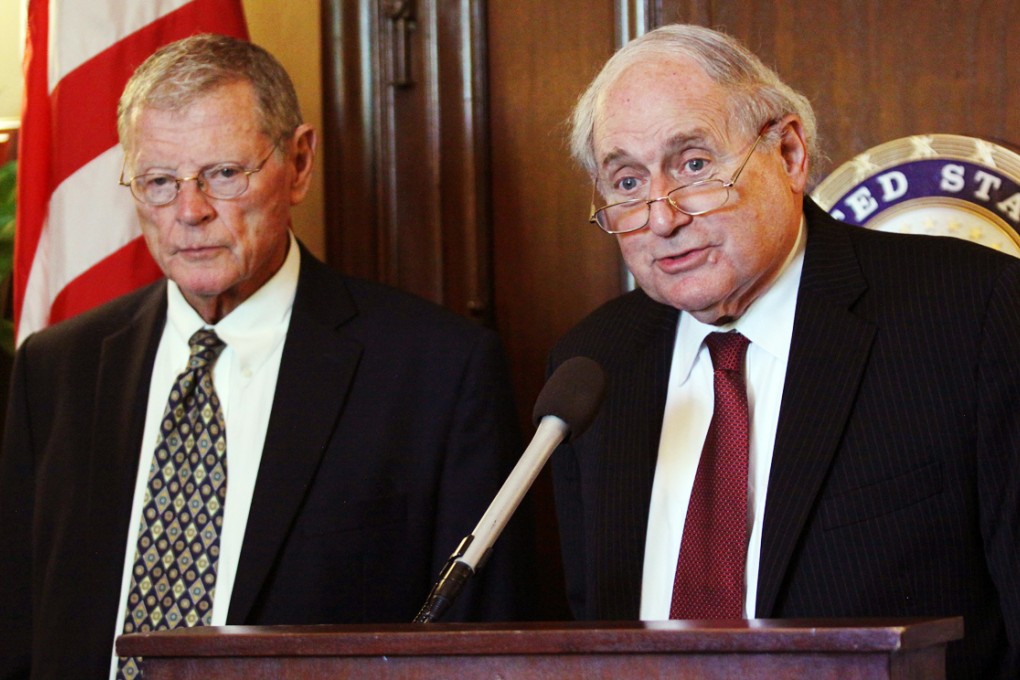 Senate Armed Services Committee chairman Senator Carl Levin talks to media about cyberattacks from China. Photo: AP