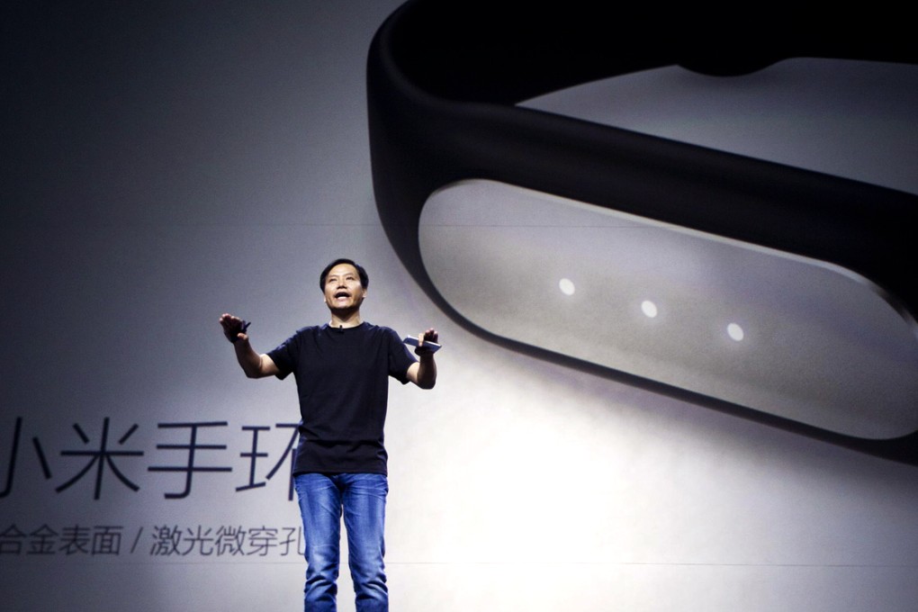 CEO Lei Jun launches Xiaomi's smart wristband. Photo: Simon Song
