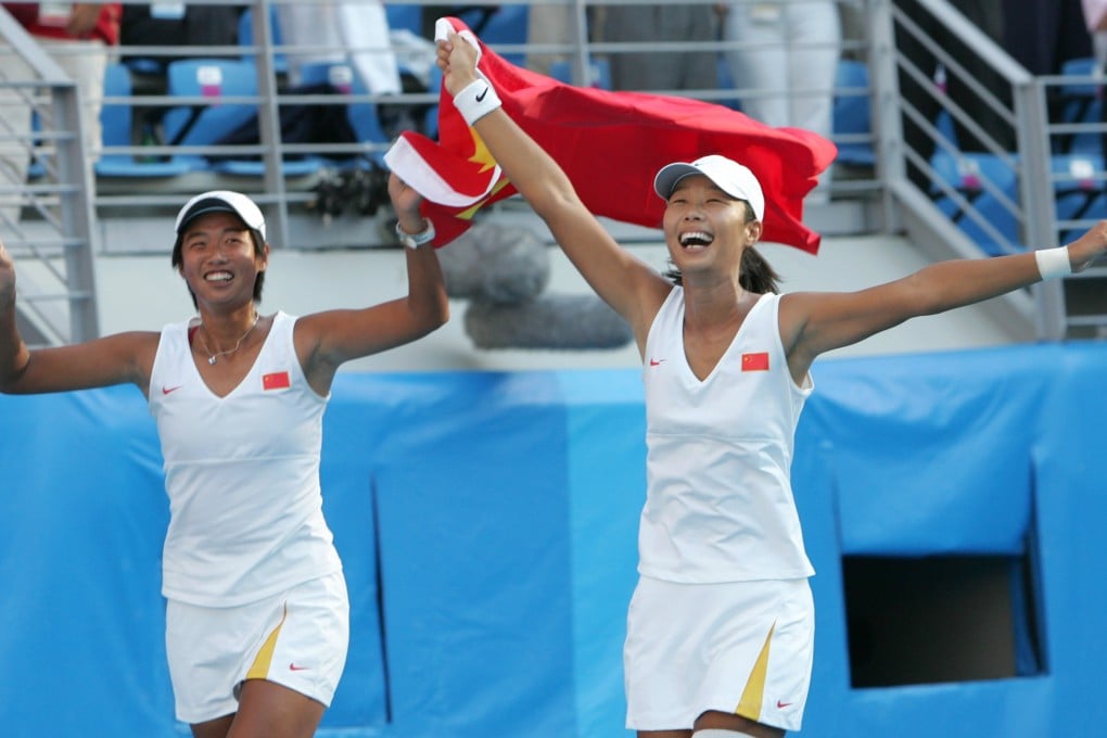 Li Ting and Sun Tiantian after winning doubles gold at the 2004 Olympic Games in Athens. Photo: Reuters