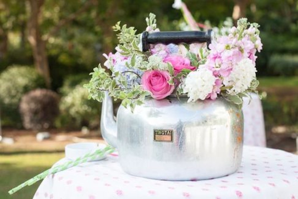 Quirky vases and English blooms at the Orrock wedding. From POP Ltd.