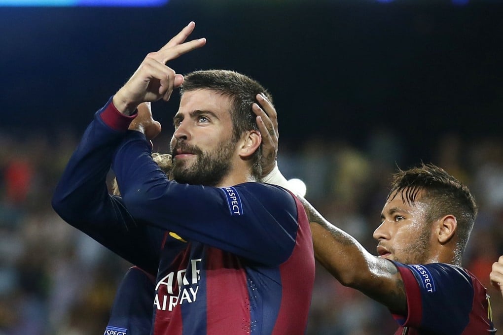 Barcelona's Gerard Pique (left) celebrates a goal next to Neymar against Apoel Nicosia in their Champions league match. Rich clubs like Barcelona have broadcasters knocking on their doors. Photo: Reuters