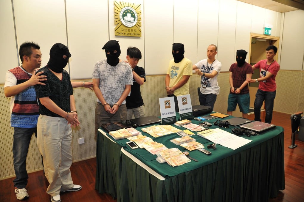 Illegal gambling suspects in Macau. Photo: Imagine China