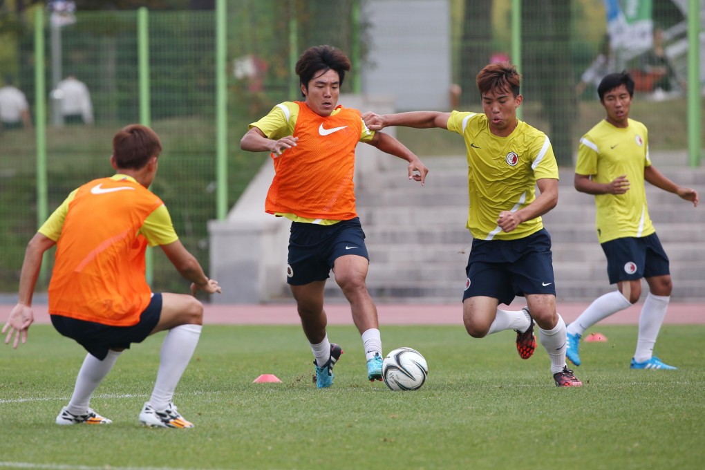 Ju Yingzhi (centre) controls the ball during a training session with Hong Kong teammates at the Goyang centre. Photo: Nora Tam