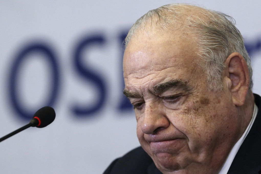 OSI Group Chairman and CEO Sheldon Lavin attends a news conference in Shanghai in July in this file image. Photo: Reuters