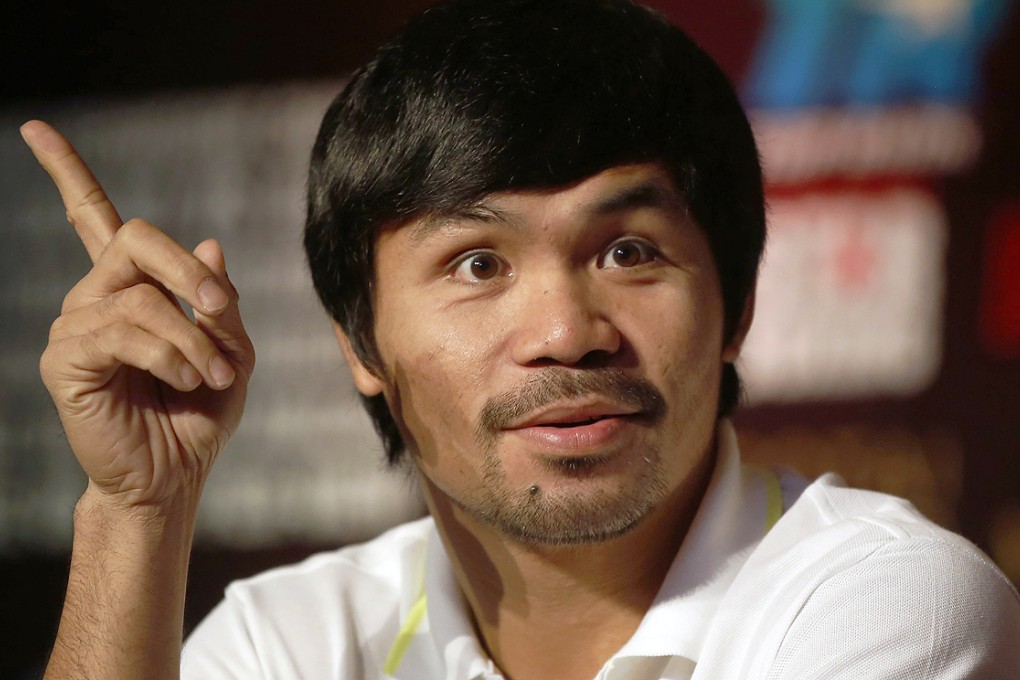 Manny Pacquiao is trying to combine boxing and basketball. Photo: Reuters