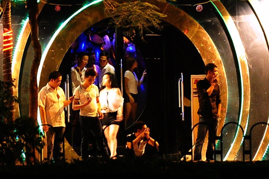 A night bar in Hanoi. Prostitution remains illegal in Vietnam, but a fierce debate over whether to legalise and regulate the industry has sprung up online. Photo: AFP