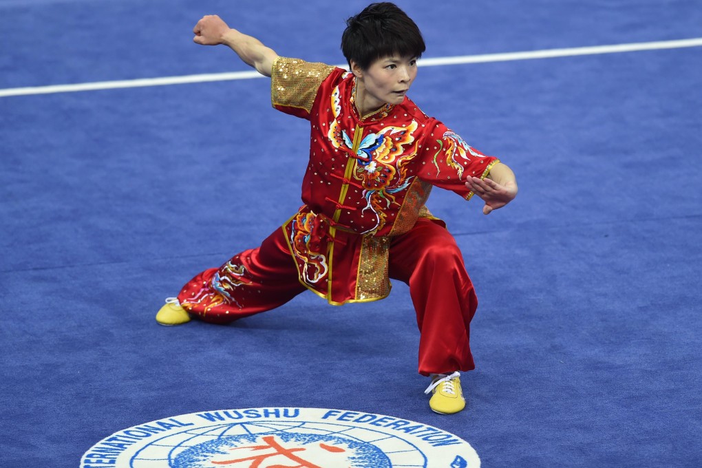 Geng Xiaoling on her way to wushu silver. Photo: Xinhua