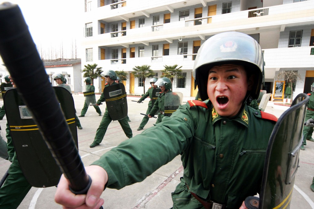 Armed policemen train in Nanjing. Photo: Reuters