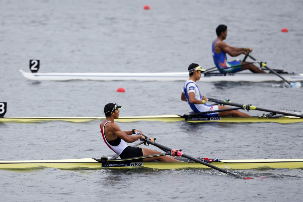 Lok Kwan-hoi leads South Korea's Lee Hak-beom and India's Dushiant Dushyant in the final of the lightweight men's single sculls. Photos: Reuter
