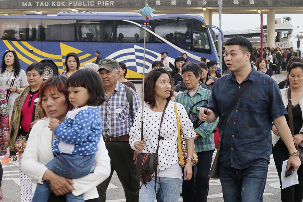 The number of mainland visitors coming to Hong Kong on group tours during the National Day "golden week" holiday next month is expected to be down almost a third on last year. Photo: K.Y. Cheng