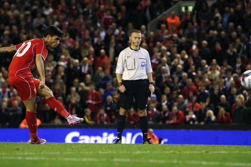 Liverpool's Suso scores the final penalty of the shoot-out against Middlesbrough. Photo: Reuters