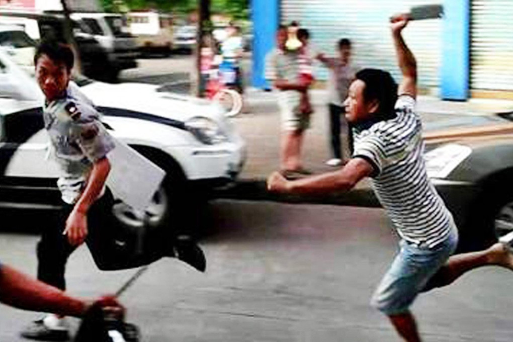 The shopkeeper chases after the officer in Foshan. Photo: SCMP Pictures