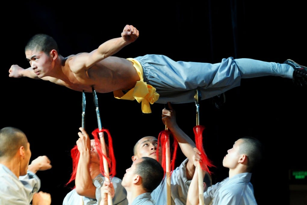 Buddhist monks from the Shaolin temple perform in Dakar, Senegal. Photo: AFP