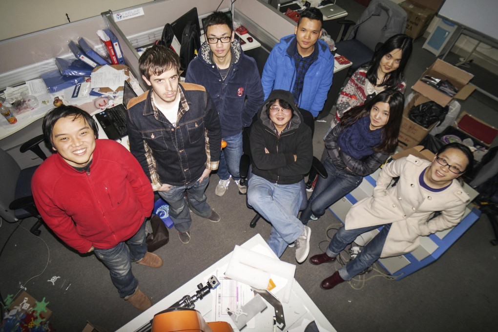 Benjamin Black (second from left) and colleagues at Guiyang-based Flexbot. Black relocated from California to join Flexbot.