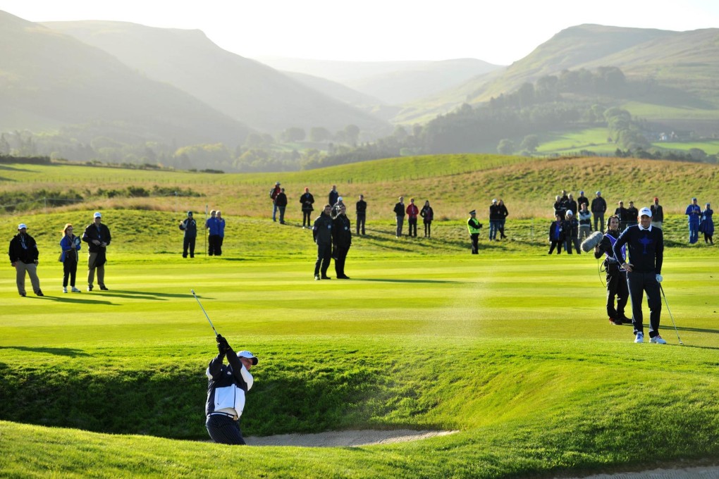 American Phil Mickelson plays a shot out of a bunker on the third hole during the first day of the 40th Ryder Cup at Gleneagles in Scotland. Photo: AFP