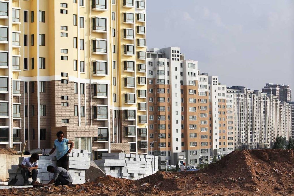 The Kangbashi New Area in Ordos, Inner Mongolia, which was built in 2004 to house a million people but was home to less than 30,000 by mid 2012. Photo: EPA