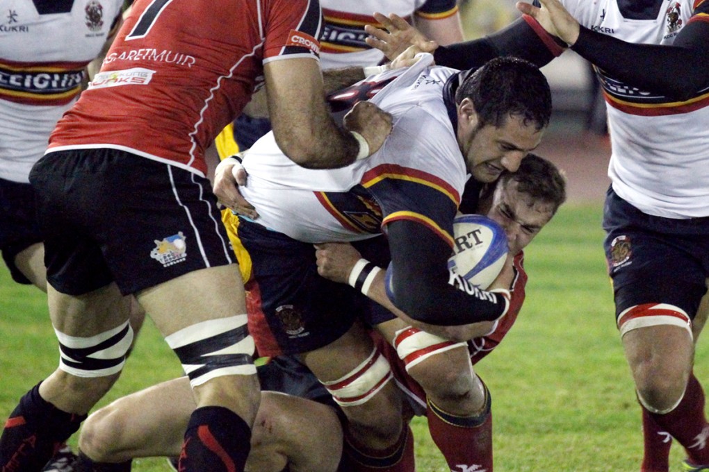 Leighton Asia HKCC (white) and Societe Generale Valley (red) will resume their bruising Premiership rivalry at King’s Park on Saturday evening. Photo: Dickson Lee/SCMP