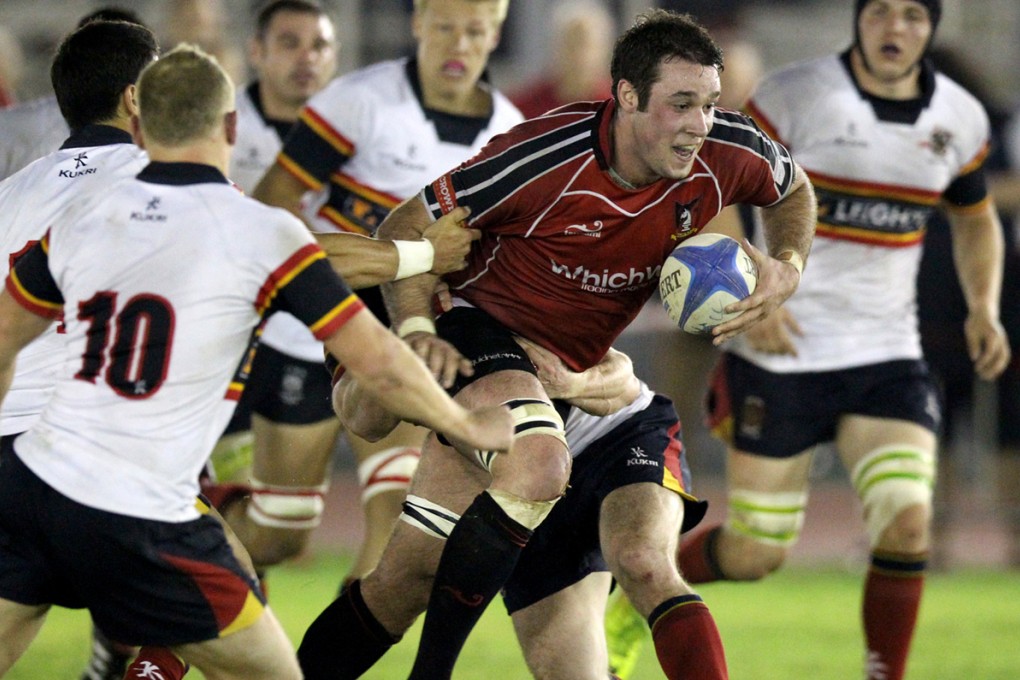 League champions HKCC (white) and Grand Championship title holders Valley (red) meet in the first round of the 2014-15 HKRFU Premiership, which runs 27 September 2014 to 7 February 2015. Photo: Dickson Lee/SCMP