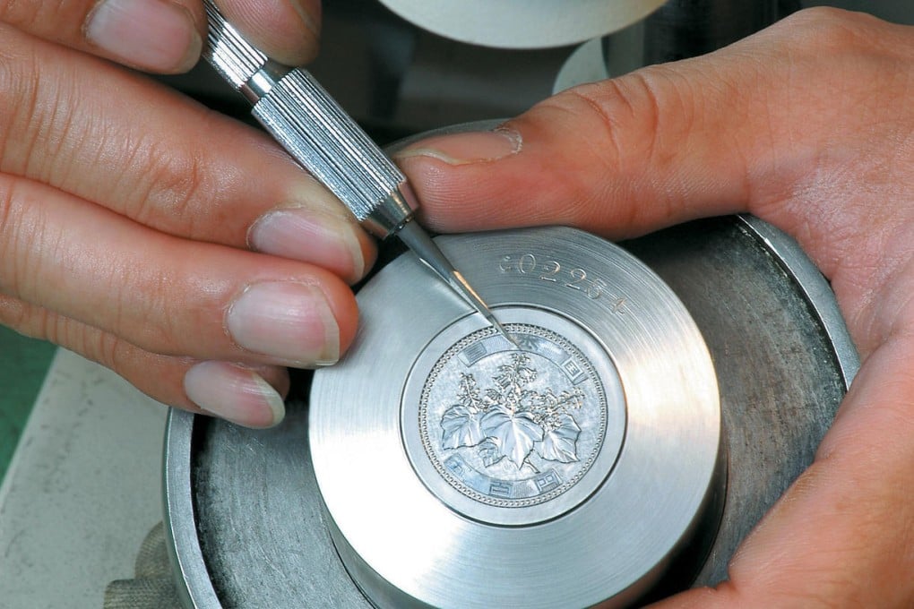 A Japan Mint worker creates a Cambodian coin. Photo: Japan Mint