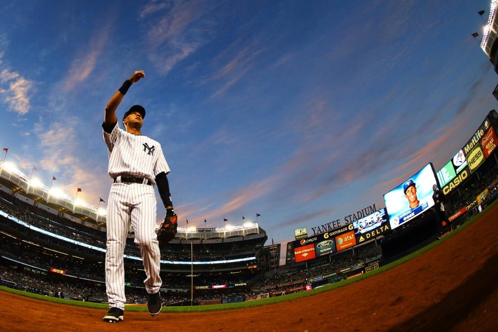Derek Jeter waves to the fans at Yankee Stadium after his last game at the ballpark he has called home for 20 years. Photo: AFP